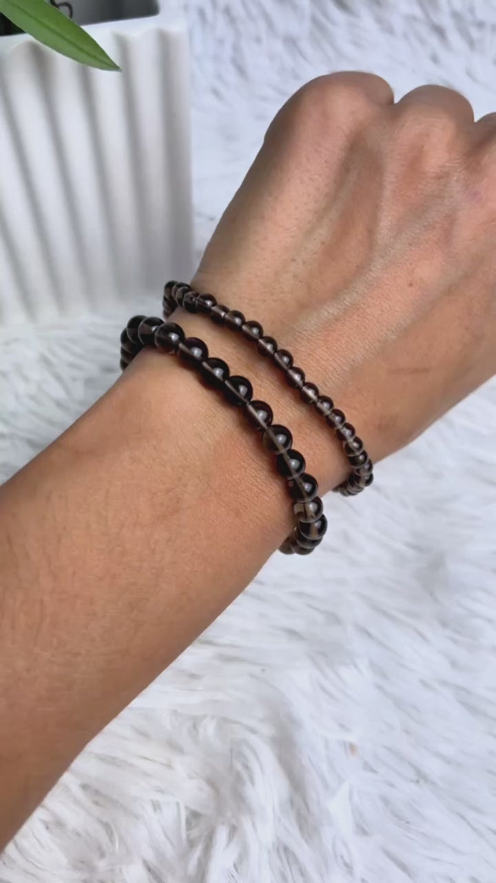 Video Rauchquarz Kugelarmband in zwei Größen